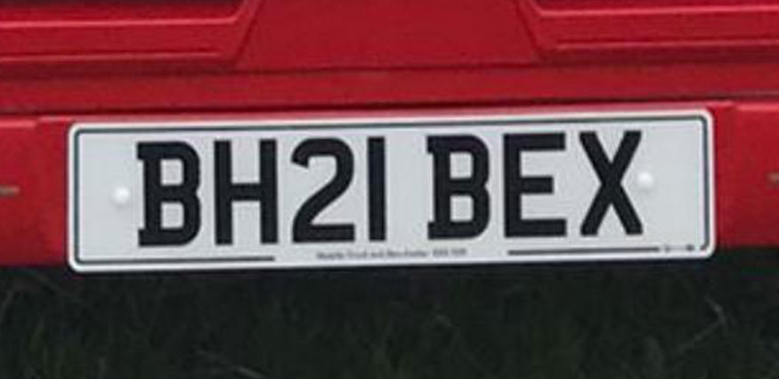 Black white number plate saying BEX
