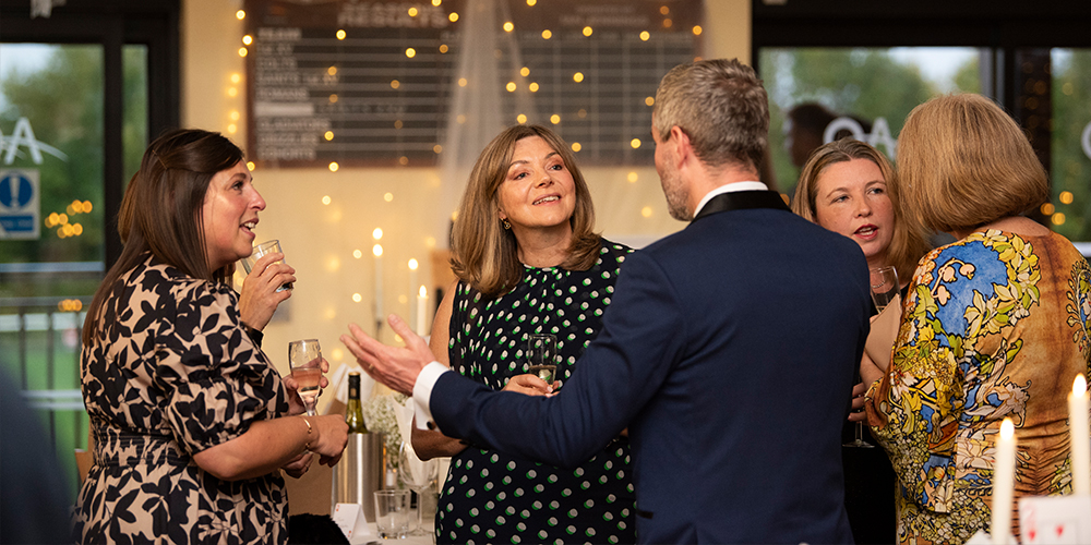 scientist looking in telescope